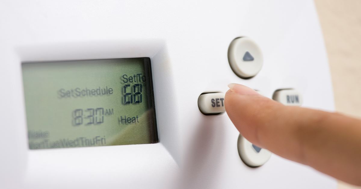 setting temperature on a thermostat